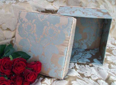 Detail of lid and interior of this square box